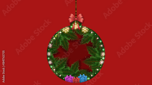 A large circle cut into a red background reveals a forest scene. Gifts and pine branches fill the shape of a hanging ornament.