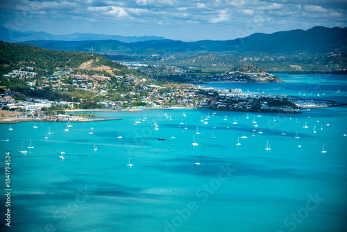 Εκτύπωση καμβά Aerial top view of Airlie Beach coastline from airplane overlooking turquoise tr