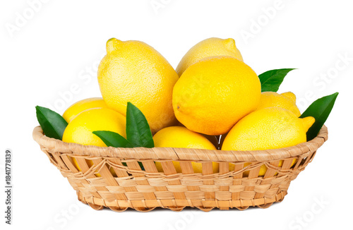 Lemons in the basket isolated on a white background, contour.