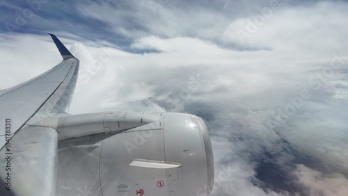 Airliner Wing View Above the Clouds