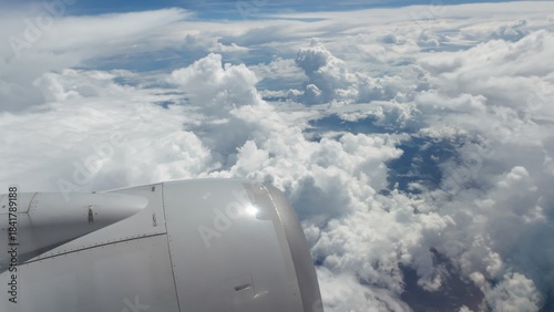 Airliner Wing View Above the Clouds