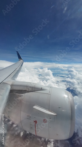 Airliner Wing View Above the Clouds