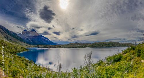 Photos Torres del Paine in Chile captured with dramatic granite peaks, pristine lakes, rugged Patagonian landscape, natural wilderness scenery, iconic travel destination and majestic mountain panorama views