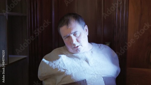 The glass reflection became the only witness to his powerlessness. A drunkard is locked in his own mind, where the walls are despair.Mentally ill person