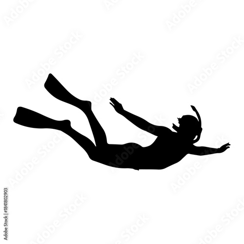 Silhouette of a person snorkeling in the ocean.