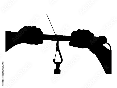 Silhouette of hands gripping a kiteboarding control bar with a hook.