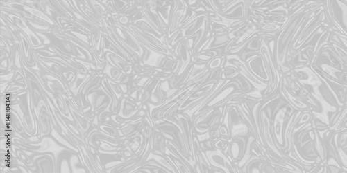 White crumpled paper texture with a silvery metallic aluminum foil pattern and a cold, frosted winter backdrop. Abstract crystalized white or grey crumpled paper, Shiny and glossy marble texture, gray