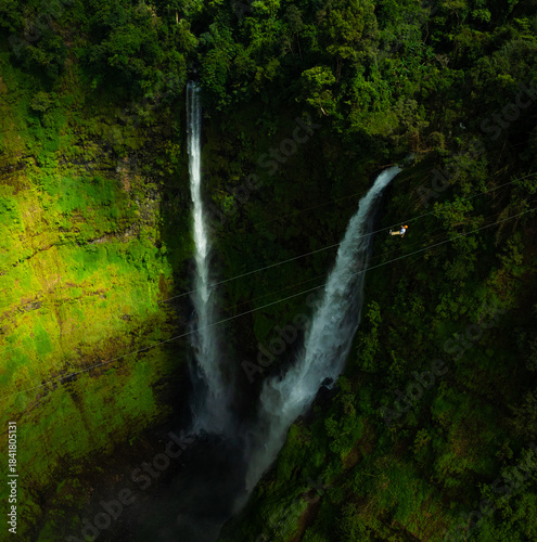 Zipline flights. Tad Fane waterfall in rainforest at Pakse and Champasak city Laos. Tour tourism and travel in Asia.