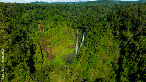 Zipline flights. Tad Fane waterfall in rainforest at Pakse and Champasak city Laos. Tour tourism and travel in Asia.