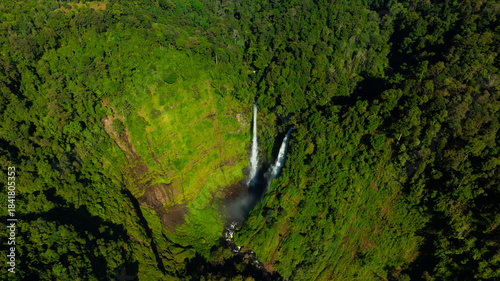 Zipline flights. Tad Fane waterfall in rainforest at Pakse and Champasak city Laos. Tour tourism and travel in Asia.