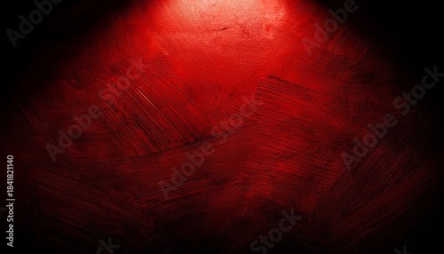 dramatic spotlight illuminating a dark textured surface with a red hue creating a mysterious and intense atmosphere