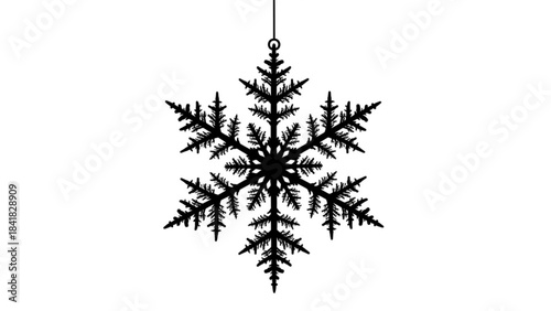 Black snowflake ornament hanging from a string on