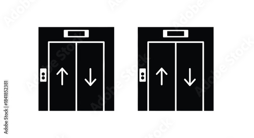 Two black elevator doors with up and down arrow symbols displayed