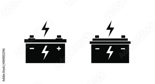 Two black car batteries with lightning bolt symbols energy and power