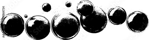 Dynamic black and white stencil art of bursting ink bubbles for creative design
