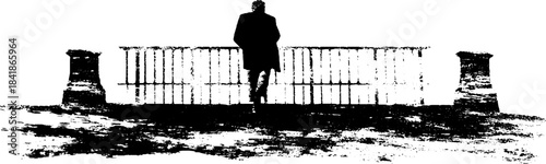 Monochrome urban silhouette of a lone figure leaning against a fence