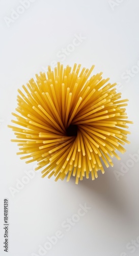 A classic dry bundle of Italian spaghetti pasta, tightly grouped and vertically oriented, standing isolated on a bright white surface ,lunch ,meal ,hard