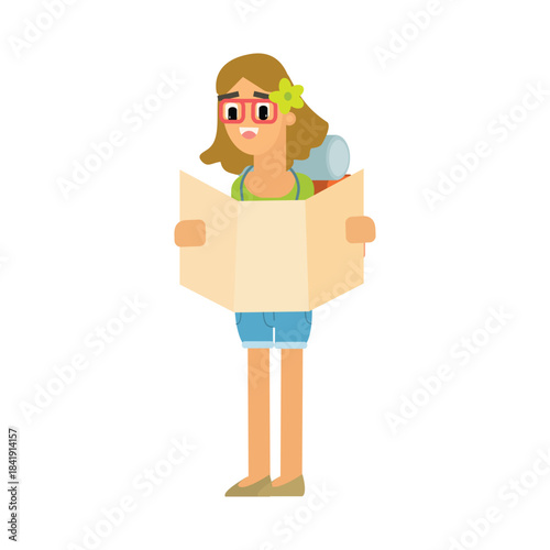 Female tourist holding and reading a map, trying to find a location or route