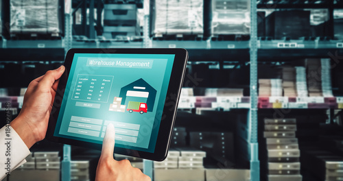 Tableau sur toile Warehouse management innovative software in computer for real time monitoring of goods package delivery