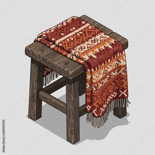 Rustic wooden stool with a vibrant woven patterned blanket draped over it for cozy decor