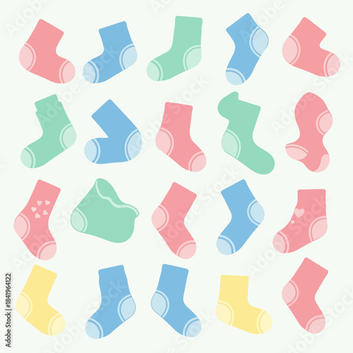 Collection of colorful baby socks in pastel shades arranged in a pattern for children's fashion