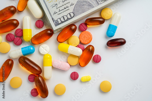 Medicine prescription drugs cost concept, Pills on money dollars, healthcare expenses