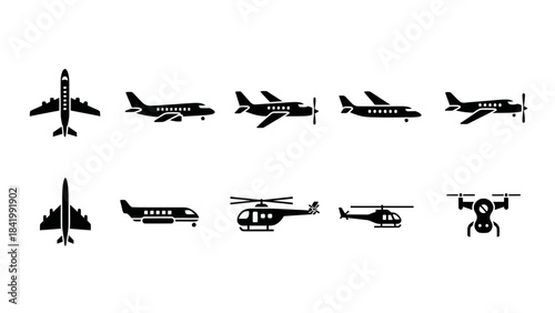 Collection of black silhouetted airplanes and helicopters for design elements