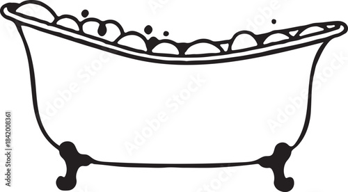 clawfoot bathtub filled with bubbles