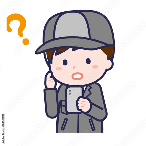 スマートフォンを使う「工場作業員」の男性