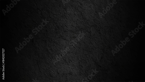 Vintage dark black grunge wall texture for an old rough seamless surface backdrop