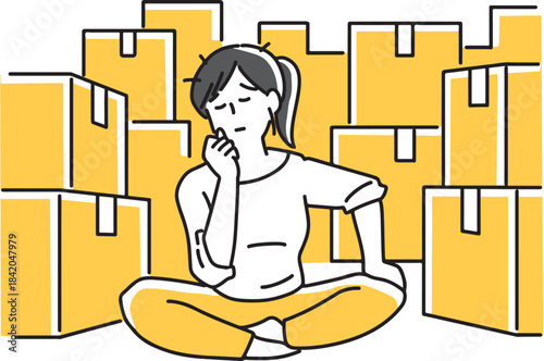 荷物に囲まれて憂鬱になる女性