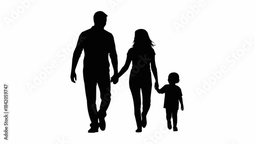 Silhouette of a happy family walking together holding hands.