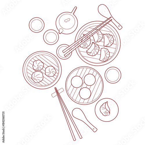 Steamed dumplings in bamboo baskets with chopsticks and teapot