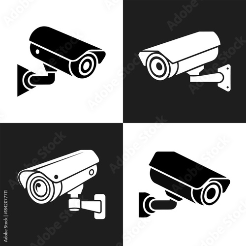 Four security surveillance cameras mounted on walls in contrasting black and white backgrounds