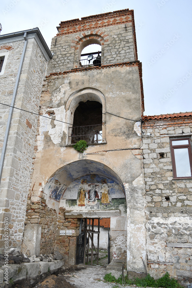 Fototapeta premium Treskavec, Macedonia-April 27, 2019 View of the Treskаvec Monastery, built on top of a hill. It is being renovated after a fire that almost destroyed it. It is dedicated to the Holy Mother of god.