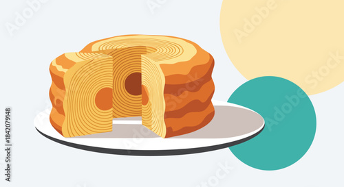 A German baumkuchen, or tree cake, with a slice cut out to show its characteristic rings, served on a white plate.