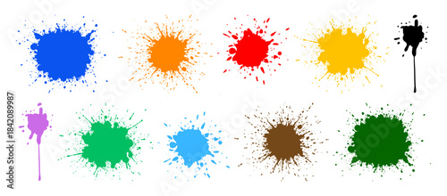 Colorful paint splatters in various hues on