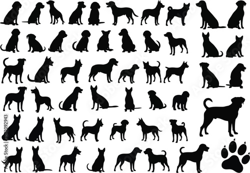 A comprehensive collection of black dog silhouettes featuring various breeds and poses on a white background