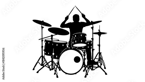 Dynamic silhouette of a musician passionately playing a drum kit, showcasing energetic musical performance
