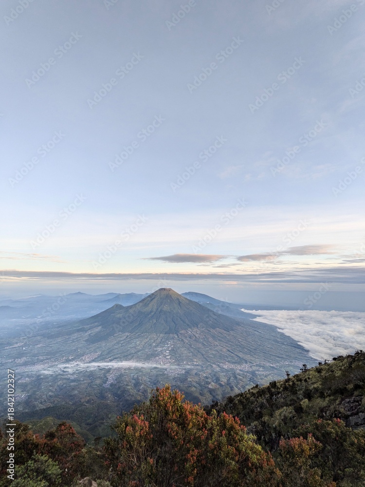 Fototapeta premium Man in Jacket Watching Mountain Sunrise