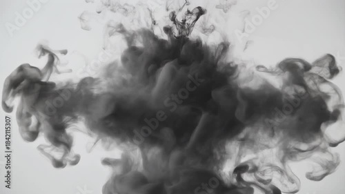 Black Ink Cloud Explosion Underwater Abstract Background.