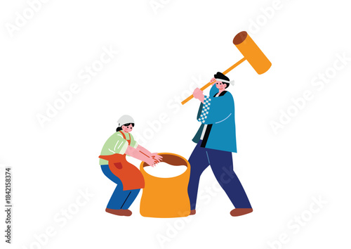 餅つきをする男女