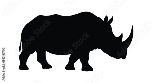 A striking black rhino depiction in profile showcasing its powerful form and distinctive horn silhouette