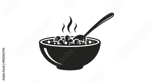 A black bowl of cereal with a spoon and rising steam a striking silhouette