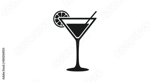 A striking black and white image of a classic martini glass with a lemon slice silhouette