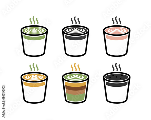 Variety of specialty coffee drinks in cups with decorative toppings