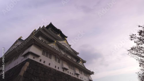 【4K Time-lapse】Majestic Osaka Castle with Historic Stone Walls and Low Clouds