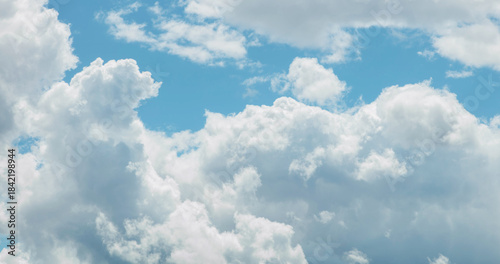 Beautifull light blue sky with dreamy clouds. A background for design