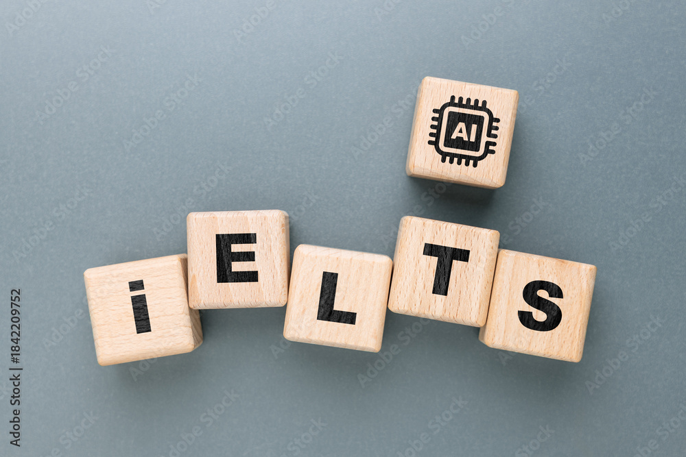 Obraz premium Wooden blocks arranged to spell IELTS with an additional AI icon block, symbolizing English test preparation supported by artificial intelligence, modern educational technology