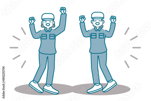 元気にガッツポーズをするヘルメットを被った作業服の女性たち